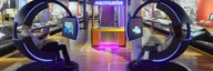 A view of the Change zone in the core exhibition of the Museum of Communication. In the foreground are two futuristic swivel chairs, in the background a play station. - enlarged view