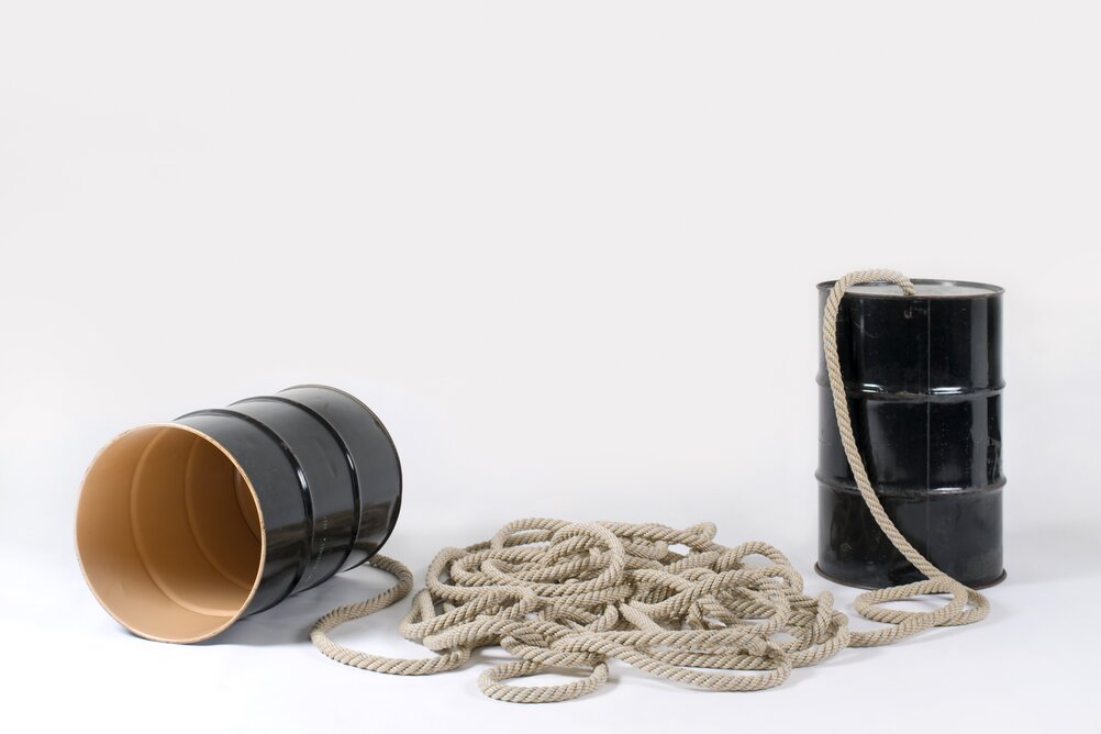Artwork "Dialogue of the Giants" by Christian Marclay You can see two large oil barrels connected with a thick rope - like an oversized can telephone.