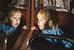 A little boy looks out of a historic post bus in amazement. - enlarged view