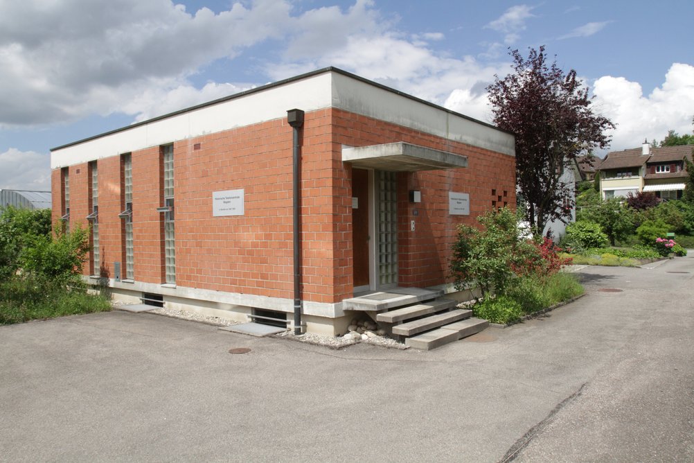 The simple brick building is Magden's historic telephone exchange.