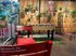 Café from inside with wooden wall and plant decoration and museum action items