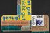Farbige Collage mit Zeitungstexten auf schwarzem Grund.  - vergrösserte Ansicht